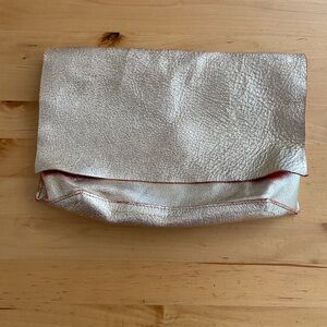 Tracey Tanner gold clutch